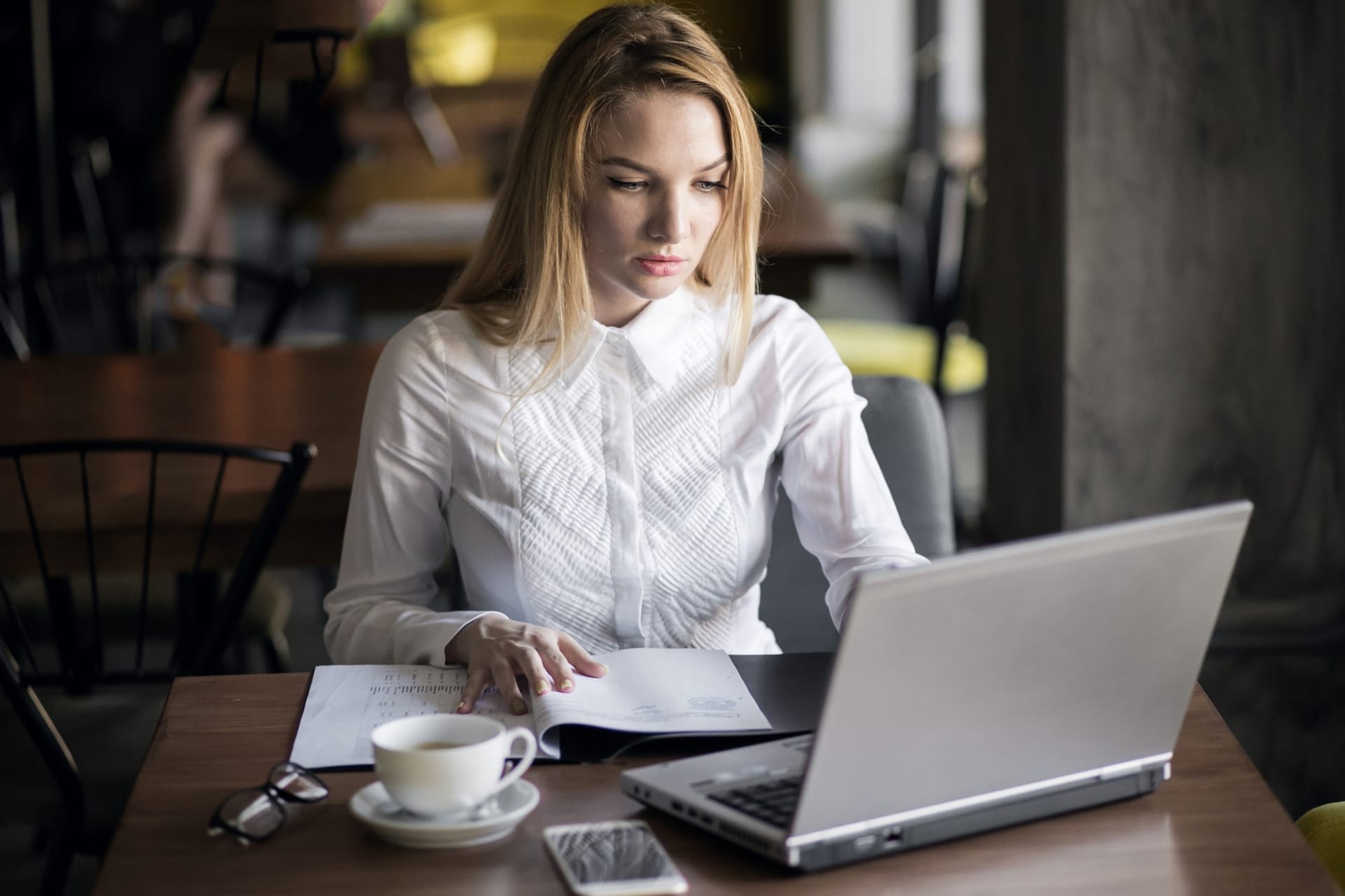 Founder preparing financial reports for investor meeting